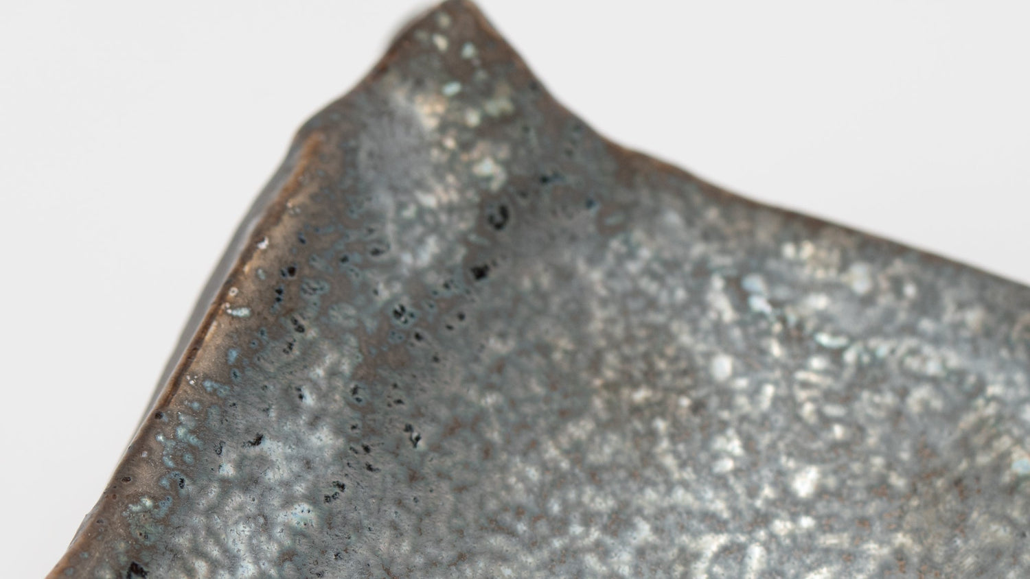 Earthly Stillness: Crafting a Grounded Sanctuary with Raw Stone and Iron Textures