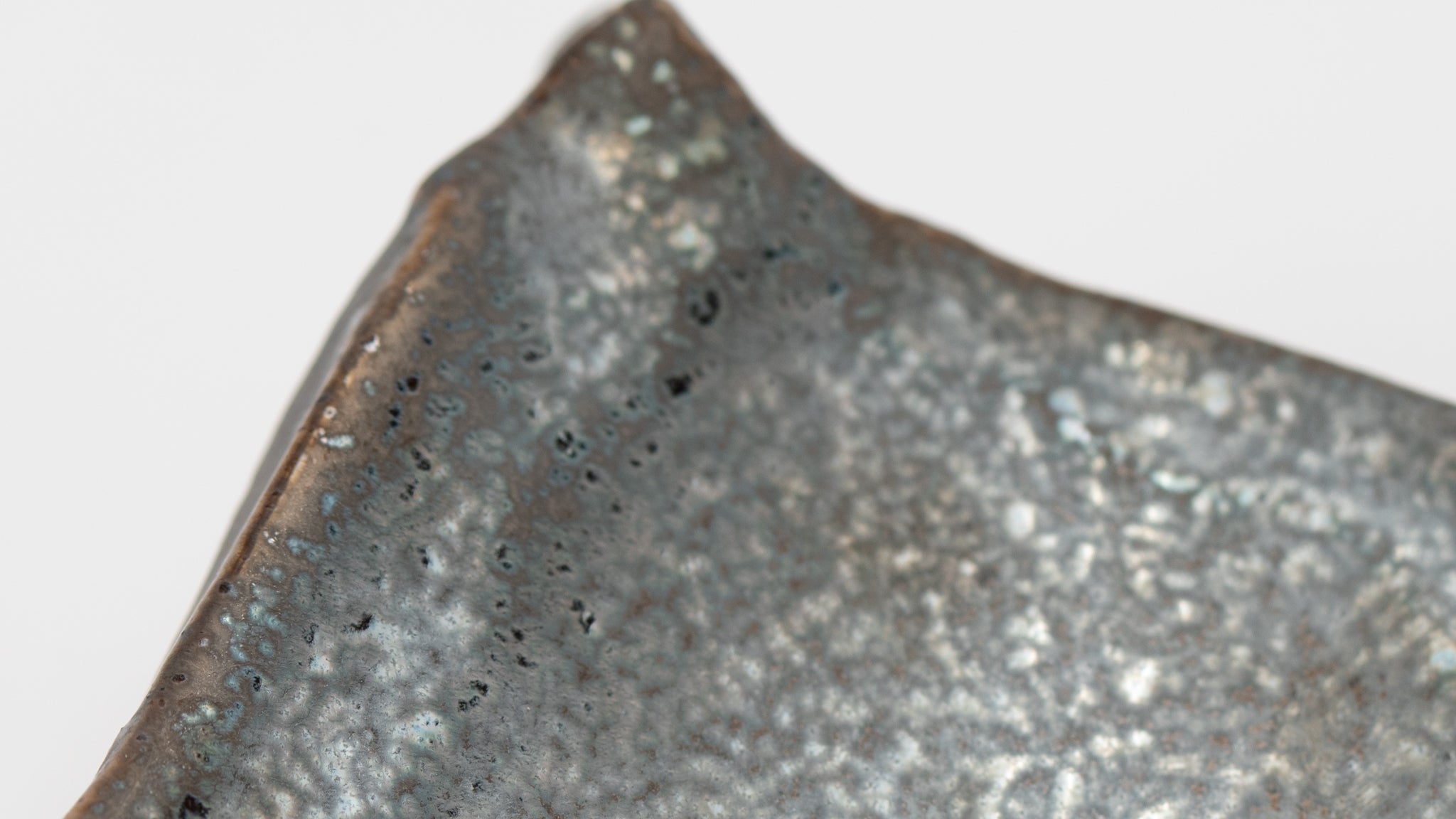 Earthly Stillness: Crafting a Grounded Sanctuary with Raw Stone and Iron Textures