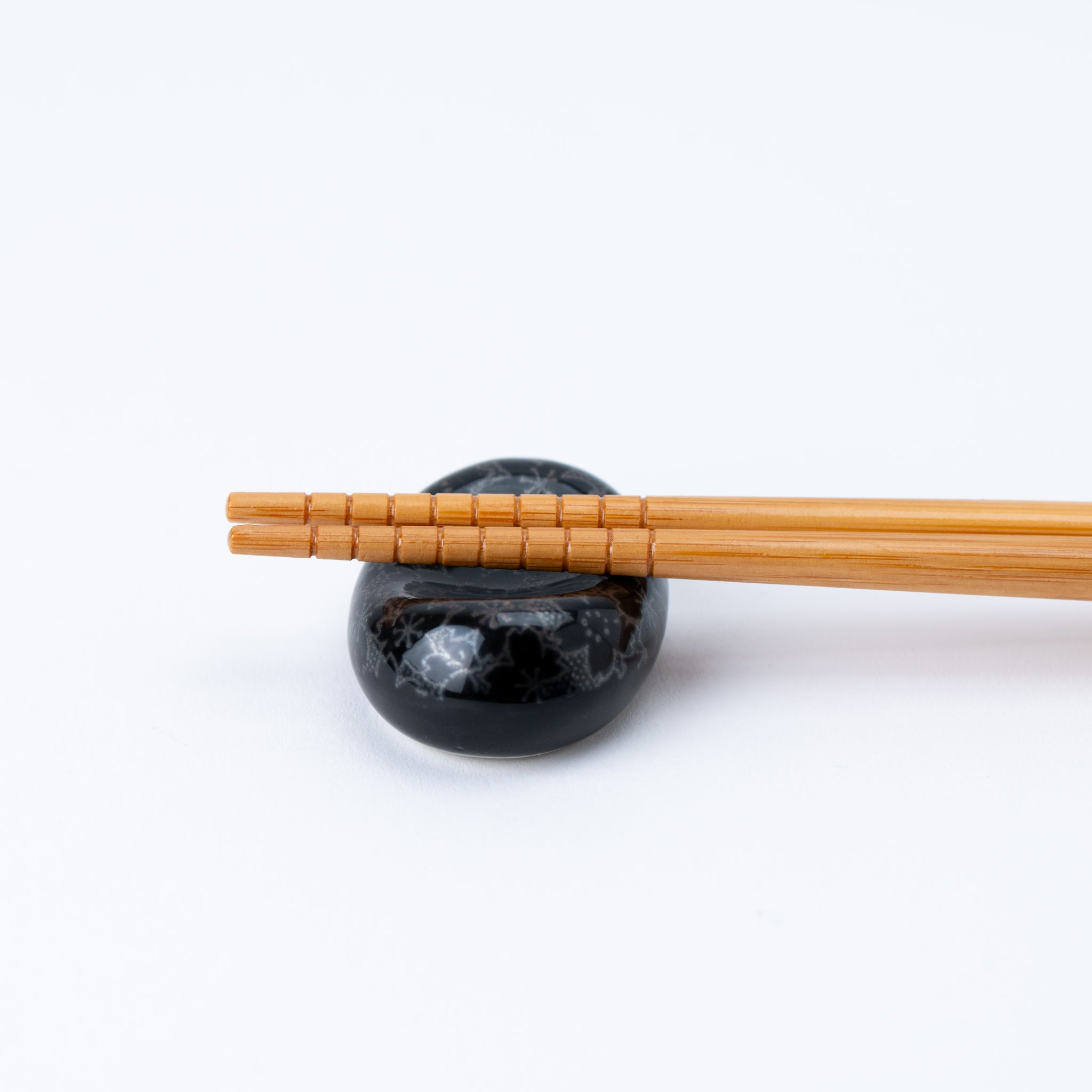 Silver Sakura Pattern Black Oval Chopstick Rest